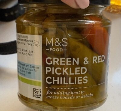 Green and red pickled chillies