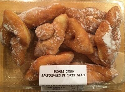 Bugnes au citron soupoudrées de sucre glace