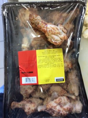 Manchons de poulet marinés cuits