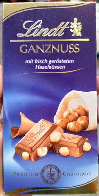 Lindt Ganznuss 4000539002809 Vollmilch-Schokolade mit ganzen Haselnüssen. Kakao: 30% mindestens in der Milch-Schokolade.