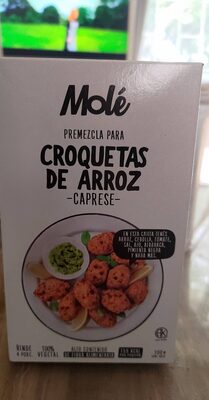 Molé, croquetas de arroz, caprese, premezcla