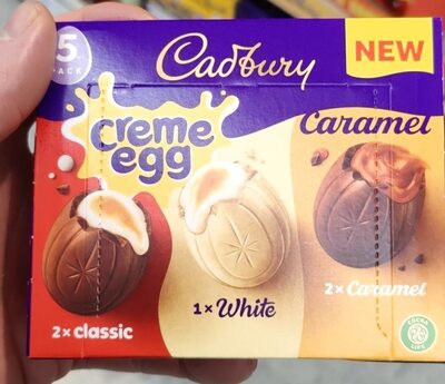 Assortment of milk chocolate eggs with soft fondan