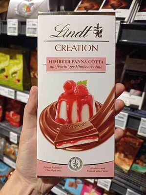 Lindt Creation Himbeer Panna Cotta 4000539113246 Vollmilch-Schokolade mit Himbeer-Füllung (9%) auf Sahne-Crème (28%). Menge: 150 g