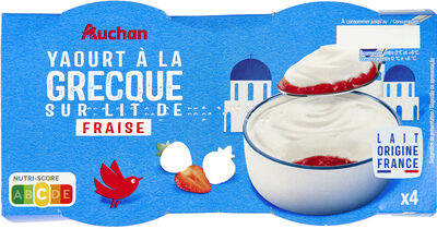 Yaourt à la grecque sur lit de fraise